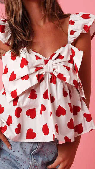 All over heart bow v-neck top by Jade Icarus