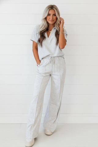 Gray sporty polo tee and drawstring pants set athleisure front view