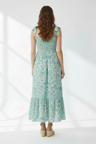 Back view of model wearing mint floral maxi dress